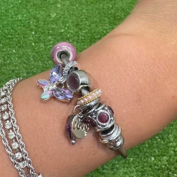 Silver color cable bracelet with purple butterfly accents - Picture 1 of 3